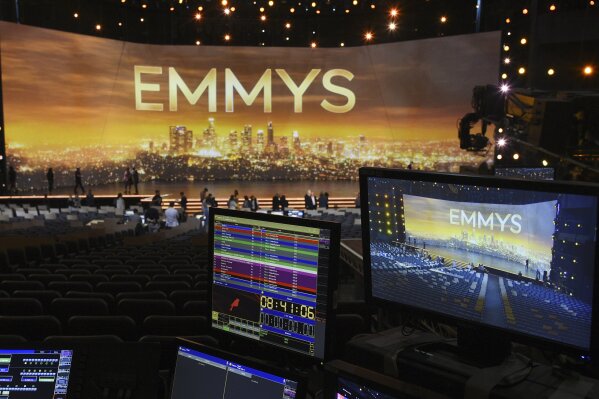 FILE - A video monitor displays the stage for Sunday's 71st Primetime Emmy Awards during Press Preview Day in Los Angeles on Sept. 19, 2019. The Emmy Awards will be held on Sept. 19 and air live on CBS. (Photo by Chris Pizzello/Invision/AP, File)