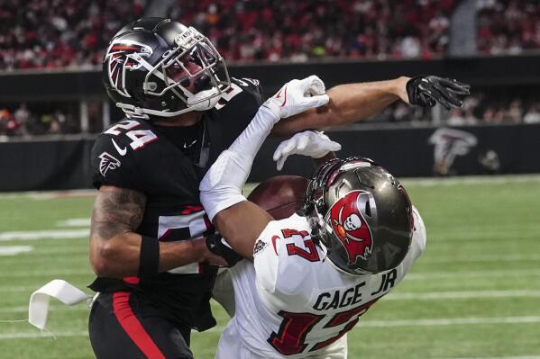 Tampa Bay Buccaneers wide receiver Russell Gage (17) makes a touchdown catch against Atlanta Falcons cornerback A.J. Terrell (24) during the first half of an NFL football game, Sunday, Jan. 8, 2023, in Atlanta. (AP Photo/John Bazemore)