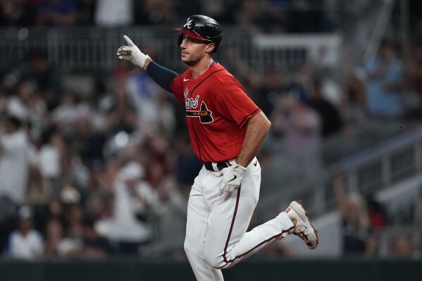 Atlanta Braves' Matt Olson (28) rounds the bases after hitting a two-run home run in the first inning of a baseball game against the Chicago Cubs, Thursday, Sept. 28, 2023, in Atlanta. (AP Photo/John Bazemore)