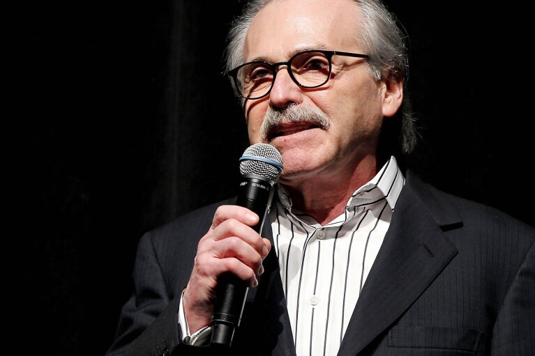 In this Jan. 31, 2014 photo, David Pecker, Chairman and CEO of American Media, addresses those attending the Shape & Men's Fitness Super Bowl Party in New York. (Marion Curtis via AP)