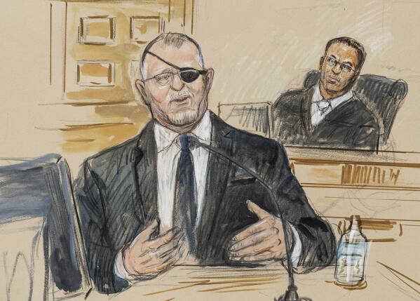 FILE - This artist sketch depicts the trial of Oath Keepers leader Stewart Rhodes, left, as he testifies before U.S. District Judge Amit Mehta on charges of seditious conspiracy in the Jan. 6, 2021, attack on the U.S. Capitol, in Washington, Nov. 7, 2022.  Jury deliberations are expected to begin soon. (Dana Verkouteren via A, File)