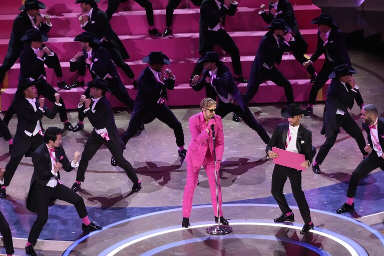 Ryan Gosling performs "I'm Just Ken" from the movie "Barbie" during the Oscars on Sunday, March 10, 2024, at the Dolby Theatre in Los Angeles. (AP Photo/Chris Pizzello)