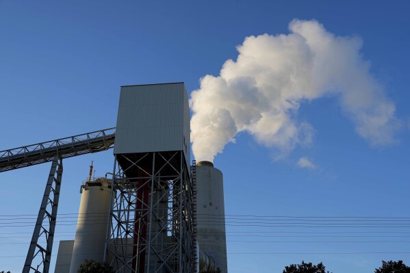 The Marshall Steam Station coal power plant operates Sunday, March 3, 2024, near Mooresville, N.C. In campaigns for Congress and for governor around the country, candidates are talking about how green the grid should be. (AP Photo/Chris Carlson)