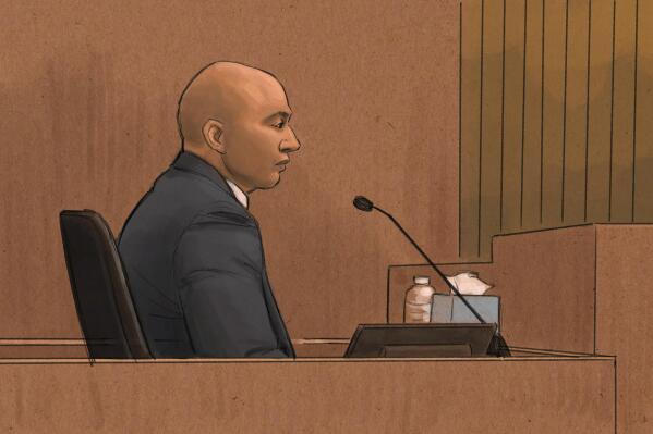 In this courtroom sketch, former Minneapolis Police Officer J. Alexander Kueng testifies during his trial in the killing of George Floyd in federal court in St. Paul, Minn., on Wednesday, Feb. 16, 2022. Kueng is one of three former officers charged in federal court with violating Floyd's constitutional rights when Officer Derek Chauvin pressed his knee into Floyd's neck for 9 1/2 minutes as the 46-year-old man was handcuffed, facedown on the street. (Cedric Hohnstadt via AP)