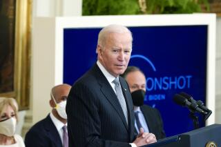President Joe Biden speaks during a "Cancer Moonshot," event in the East Room of the White House, Wednesday, Feb. 2, 2022, in Washington. As Biden launched his initiative last week, a post online made false claims about the cancer death rate. (AP Photo/Alex Brandon)