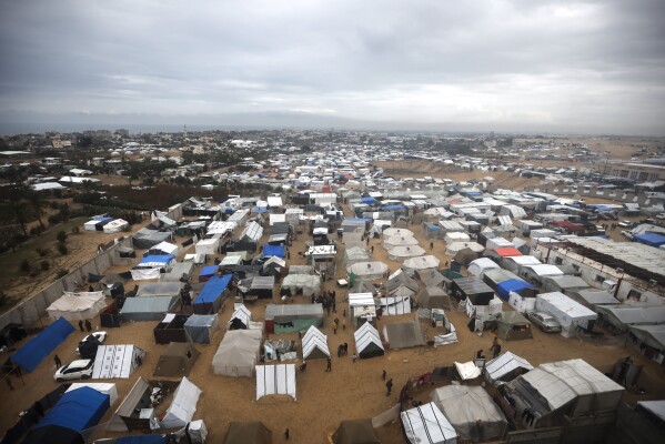 A view of a makeshift tent camp for Palestinians displaced by the Israeli ground offensive on the Gaza Strip, in Rafah, Gaza Strip, Sunday, Feb. 18, 2024. (AP Photo/Mohammed Dahman7