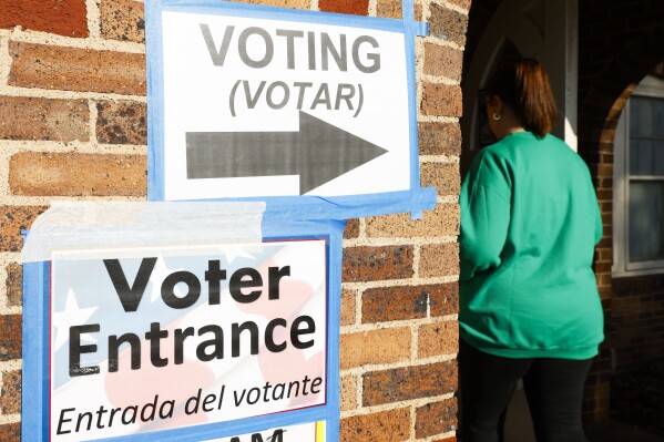 Voters enter the Ellis County Woman's Building during the state's primary election, Tuesday, March 5, 2024, in Waxahachie, Texas. (Shafkat Anowar/The Dallas Morning News via AP)