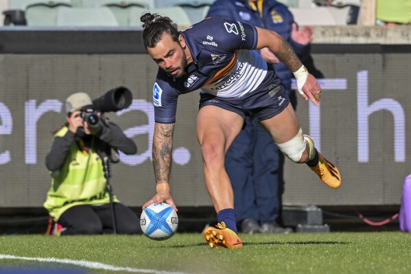 Brumbies Andy Muirhead scores a try during their Super Rugby game against the Crusaders in Canberra, Australia, Saturday, May 18, 2024. (Mick Tsikas/AAP Image via AP)