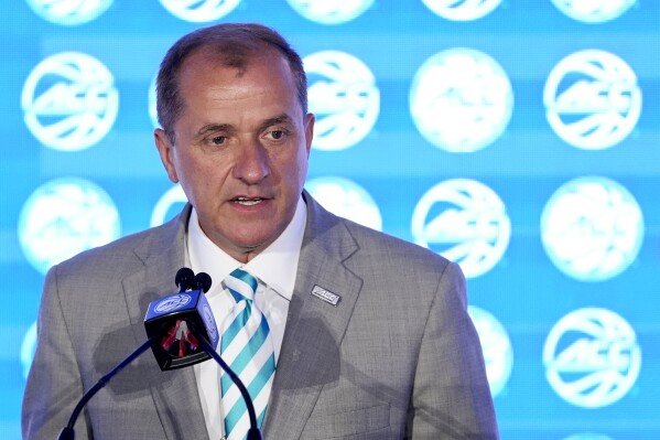 ACC Commissioner Jim Phillips speaks at an NCAA college basketball media day, Wednesday, Oct. 9, 2024, in Charlotte, N.C. (AP Photo/Chris Carlson, File)