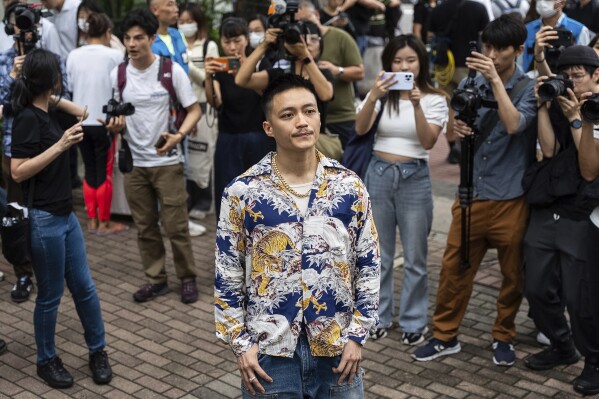 Former pro-democracy district councilor Lee Yu-shun leaves the West Kowloon Magistrate's Court in Hong Kong, Thursday, May 30, 2024. A Hong Kong court on Thursday convicted 14 pro-democracy activists in the city's biggest national security case.  A law imposed by Beijing has swept away public opposition.  Those found guilty include former lawmakers Leung Kwok-hung, Lam Cheuk-ting, Helena Wong and Raymond Chan.  But three judges appointed by the government to oversee the case acquitted former district councilors Lee and Lawrence Lau.  (AP Photo/Chan Long Hai)