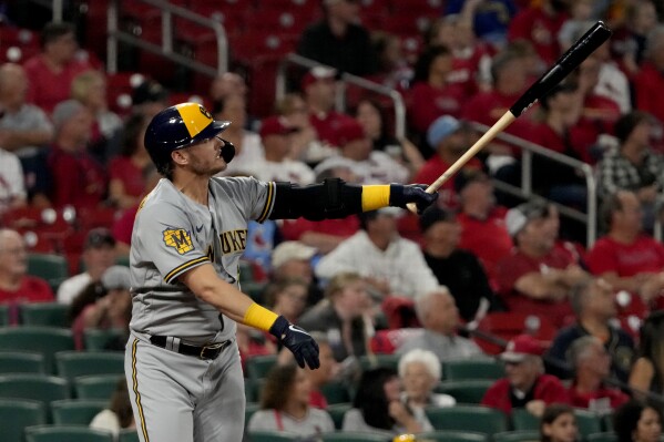 Milwaukee Brewers' Josh Donaldson watches his three-run home run during the first inning of a baseball game against the St. Louis Cardinals Wednesday, Sept. 20, 2023, in St. Louis. (AP Photo/Jeff Roberson)