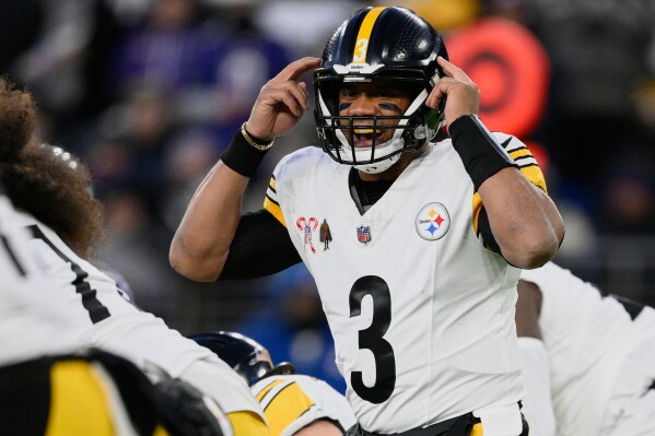 Pittsburgh Steelers quarterback Russell Wilson (3) calls out at the line of scrimmage during the first half of an NFL football game against the Baltimore Ravens, Saturday, Dec. 21, 2024, in Baltimore. (AP Photo/Nick Wass, File)