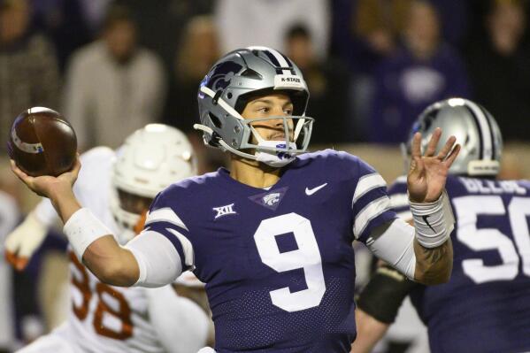 Kansas State quarterback Adrian Martinez (9) throws against Texas during the first half of an NCAA college football game Saturday, Nov. 5, 2022, in Manhattan, Kan. (AP Photo/Reed Hoffmann)