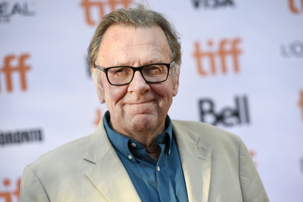 FILE - Tom Wilkinson arrives at the "Denial" premiere on day 4 of the Toronto International Film Festival at the Princess of Wales Theatre on Sunday, Sept. 11, 2016, in Toronto. Tom Wilkinson, the Oscar-nominated British actor known for his roles in “The Full Monty," “Michael Clayton” and “The Best Exotic Marigold Hotel,” has died, his family said Saturday, Dec. 30, 2023. He was 75. (Photo by Chris Pizzello/Invision/AP, file)