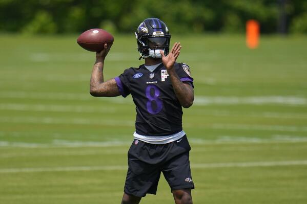 Baltimore Ravens quarterback Lamar Jackson works out during the team's NFL football practice, Wednesday, May 24, 2023, in Owings Mills. (AP Photo/Julio Cortez)