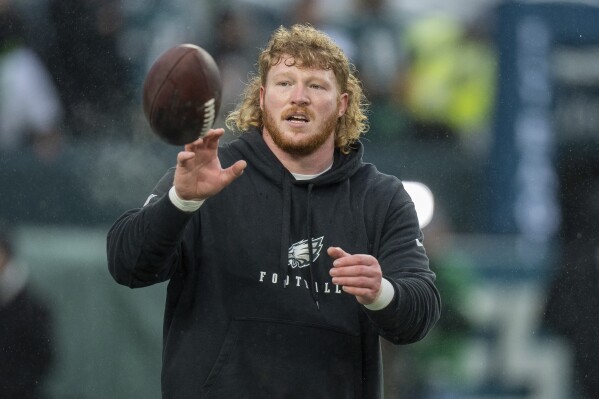 Philadelphia Eagles center Cam Jurgens (51) looks on during warm-ups prior to the NFL divisional playoff football game against the Los Angeles Rams, Jan. 19, 2025, in Philadelphia. (AP Photo/Chris Szagola, File)