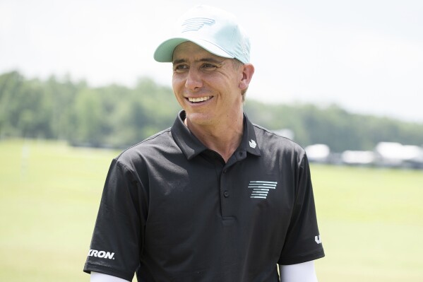 Carlos Ortiz, of Torque GC, smiles on the driving range during the final round of LIV Golf Houston at Golf Club of Houston, Sunday, June 9, 2024, in Humble, Texas. (Charles Laberge/LIV Golf via AP)