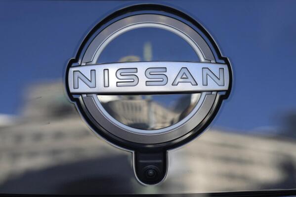 FILE - A Nissan logo is seen on a car at its showroom in Tokyo, Feb. 21, 2023. Nissan is recalling more than 809,000 small SUVs in the U.S. and Canada, Tuesday, Feb. 28, because a key problem can cause the ignition to shut off while they’re being driven. The recall covers Rogues from the 2014 through 2020 model years, as well as Rogue Sports from 2017 through 2022. (AP Photo/Shuji Kajiyama, File)