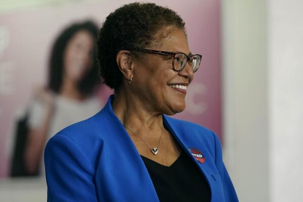 FILE - Democratic U.S. Rep. Karen Bass smiles after casting her vote in the contest to become Los Angeles' next mayor in the 2022 primary election at the Baldwin Hills Crenshaw Mall Community in Los Angeles on June 7, 2022. President Joe Biden and Vice President Kamala Harris jointly endorsed Bass on Tuesday, Aug. 2, 2022, to become the next mayor of Los Angeles, providing a boost to her campaign against billionaire developer Rick Caruso. (AP Photo/Damian Dovarganes, File)