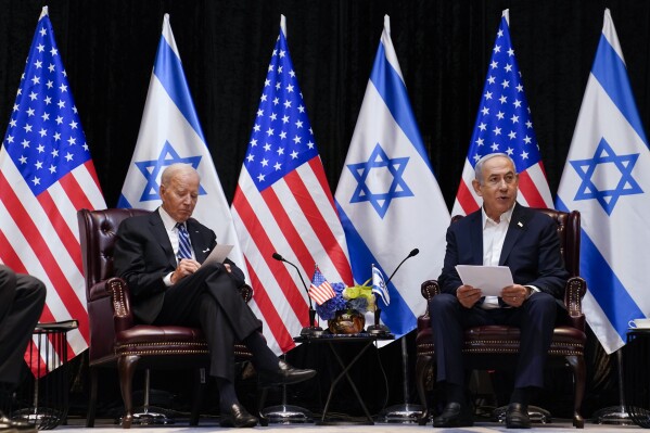 President Joe Biden and Israeli Prime Minister Benjamin Netanyahu participate in an expanded bilateral meeting with Israeli and U.S. government officials, Wednesday, Oct. 18, 2023, in Tel Aviv. (AP Photo/Evan Vucci)