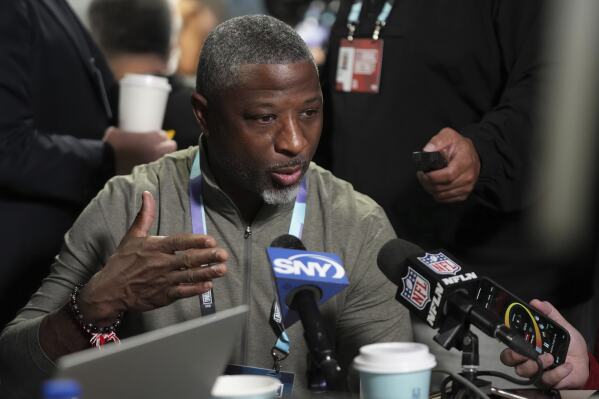New York Jets head coach Aaron Glenn is interviewed at the NFL football annual meetings Monday, March 31, 2025, in Palm Beach, Fla. (AP Photo/Lynne Sladky)