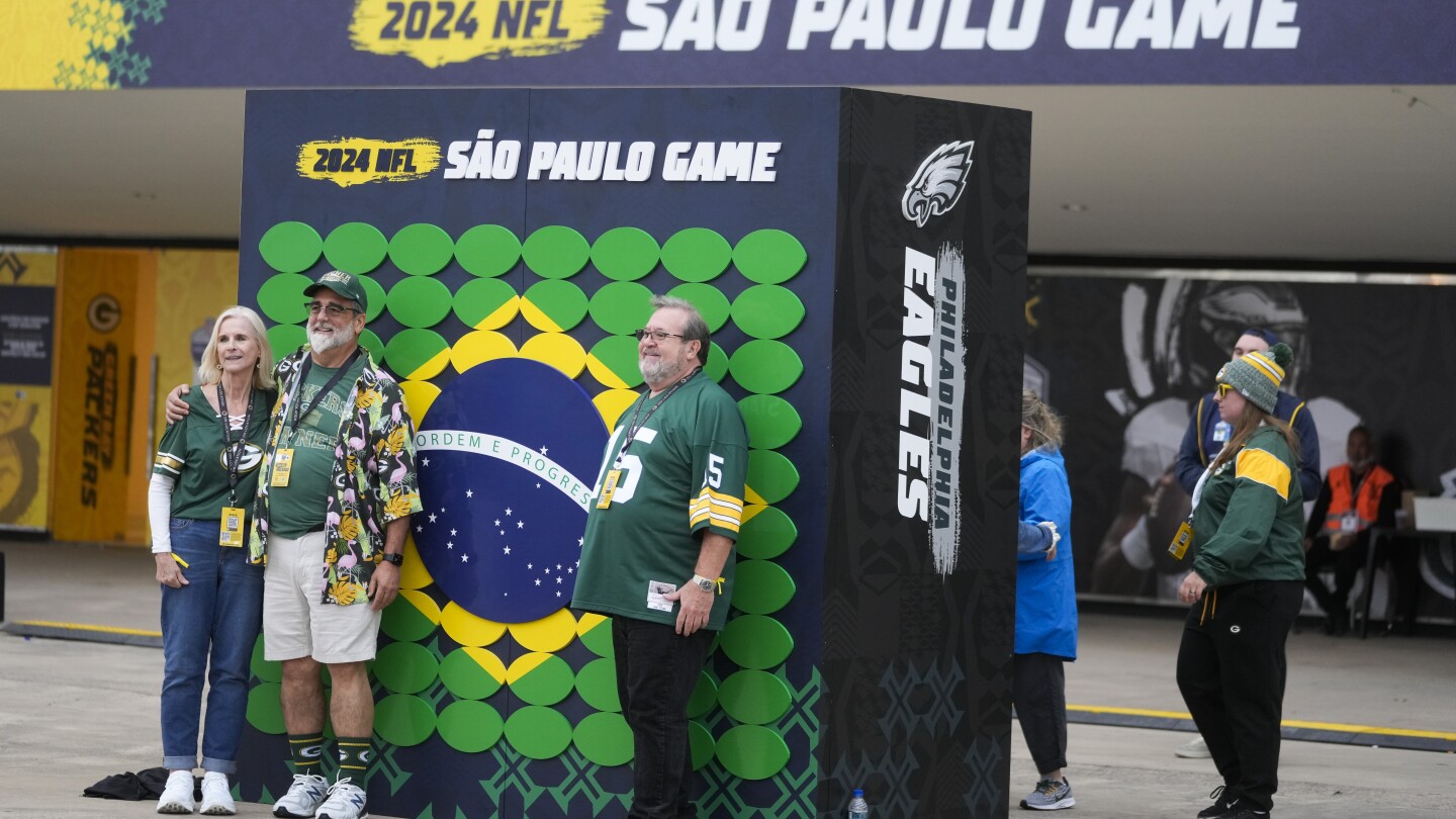 Some NFL fans are defying the host football club’s preference and wearing green jerseys at the Packers’ game against the Eagles in Brazil.