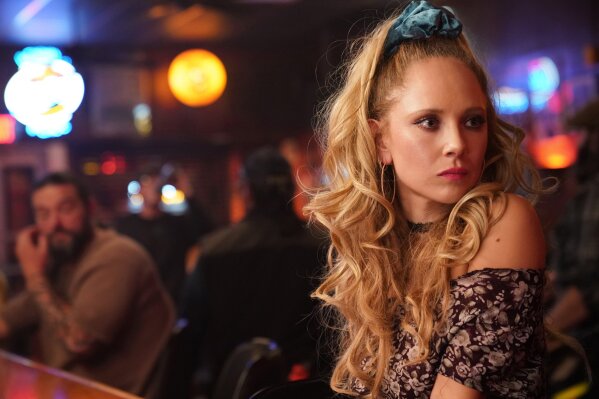 This image released by Apple shows Juno Temple in a scene from “Palmer.” (Apple via AP)