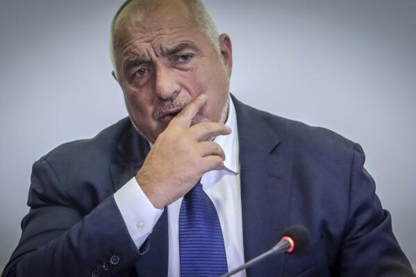Former Bulgaria Prime Minister Boyko Borissov gestures during press- conference in Sofia, Tuesday, Oct. 4, 2022. Borissov has invited his political opponents to talks on forming a government. Results from Bulgaria's election on Sunday showed his GERB party with 25.4% of the vote. Other parties passed the support threshold needed to make it into the 240-seat National Assembly. (AP Photo/Valentina Petrova)
