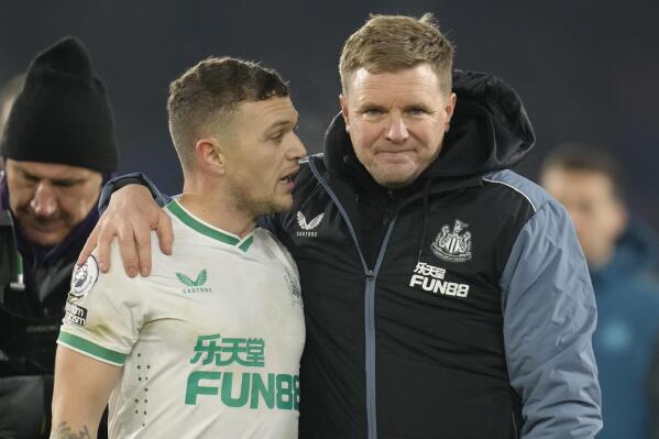 Newcastle's head coach Eddie Howe, right, hugs Newcastle's Kieran Trippier after the English Premier League soccer match between Crystal Palace and Newcastle at the Selhurst Park Stadium in London, Saturday, Jan. 21, 2023. (AP Photo/Kirsty Wigglesworth)