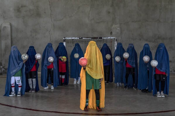 FILE - An Afghan women's soccer team poses for a photo in Kabul, Afghanistan, Thursday, Sept. 22, 2022. (AP Photo/Ebrahim Noroozi, File)