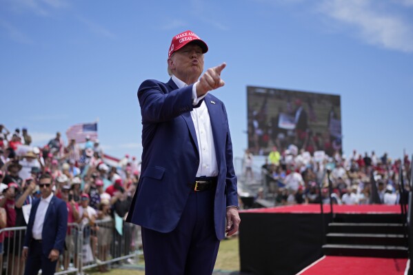 Republican presidential candidate, former President Donald Trump motions to the crowd after speaking at a campaign rally Sunday, June 9, 2024, in Las Vegas. (AP Photo/John Locher)
