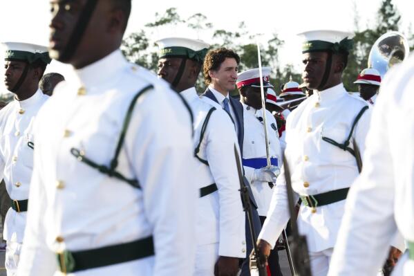 Canada Prime Minister Justin Trudeau arrives in Nassau, Bahamas, on Wednesday, Feb. 15, 2023. Trudeau will be attending the Conference of Heads of Government of the Caribbean Community. (Sean Kilpatrick/The Canadian Press via AP)
