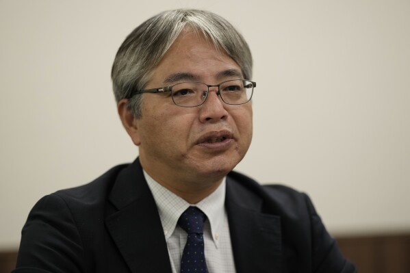 Junichi Matsumoto, an official of Tokyo Electric Power Company Holdings (TEPCO), speaks in an interview with The Associated Press at the TEPCO headquarters in Tokyo, Friday, July 28, 2023. Matsumoto, a top official in charge of the Fukushima Daiichi nuclear power plant said an upcoming release of treated radioactive water into the sea more than 12 years after the meltdown disaster marks “a milestone,” but it's still an initial step of the daunting task of the decades-long decommissioning process that still remain. (AP Photo/Hiro Komae)