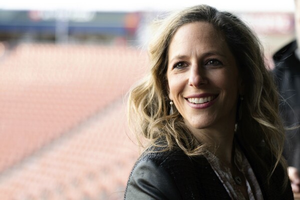 FILE - National Women's Soccer League Commissioner Jessica Berman speaks during a news conference announcing the return of the Utah Royals, March 11, 2023, in Sandy, Utah. Berman has said the process has begun to select a 16th team to join the league, with an announcement possible in the third quarter of this year. The new team will begin play in 2026, joining another expansion team already awarded to a group in Boston. (Ryan Sun/The Deseret News via AP, File)