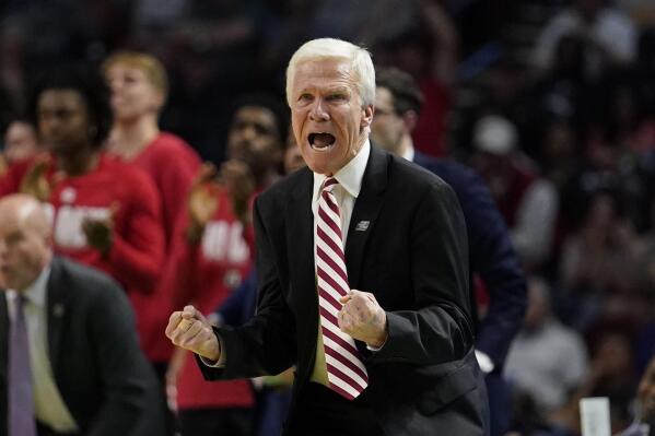 FILE - Davidson coach Bob McKillop yells during the second half of the team's college basketball game against Michigan State in the first round of the NCAA men's tournament Friday, March 18, 2022, in Greenville, S.C. Longtime Davidson coach Bob McKillop is retiring, ending a run that included coaching NBA star Stephen Curry with the Wildcats and ranking among the Division I men’s basketball’s winningest active coaches. McKillop announced his retirement Friday, June 17, 2022, at a campus news conference, effective at the end of the month. (AP Photo/Brynn Anderson, File)