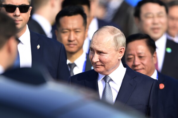 Russia's President Vladimir Putin arrives at Beijing Capital International Airport to attend the third Belt and Road Forum in Beijing, Tuesday, Oct. 17, 2023. (Parker Song/Pool Photo via AP)