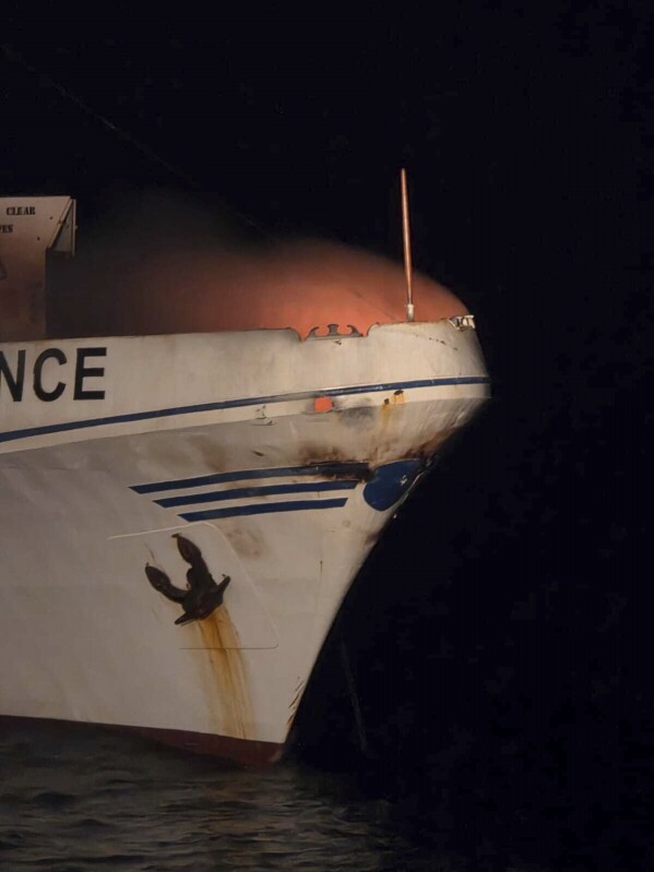 In this photo provided by the Government of Cyprus, a fire burns on the ship The Conscience, after a drone struck the vessel carrying aid to Gaza off the coast of Malta, Friday, May 2, 2025. (Government of Cyprus via AP)