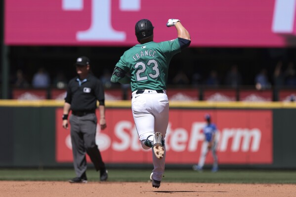 Seattle Mariners' Ty France runs the bases on a solo home run against the Kansas City Royals during the fourth inning of a baseball game Wednesday, May 15, 2024, in Seattle. (AP Photo/Jason Redmond)
