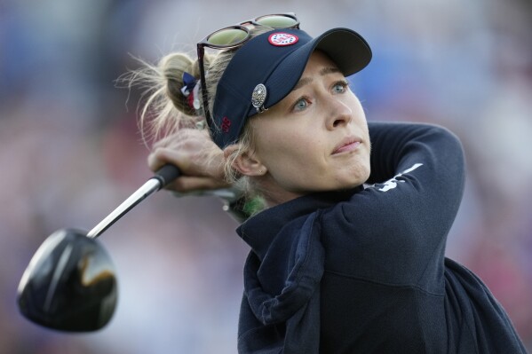 United States' Nelly Korda plays her tee shot in a foursome match with teammate United States' Allisen Corpuz at the Solheim Cup in Finca Cortesin, near Casares, southern Spain, Saturday, Sept. 23, 2023. (AP Photo/Bernat Armangue)