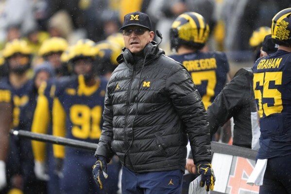 Michigan head coach Jim Harbaugh watches against Indiana in the second half of an NCAA college football game in Ann Arbor, Mich., Saturday, Oct. 14, 2023. (AP Photo/Paul Sancya)