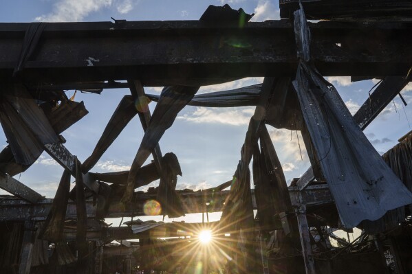 The destroyed Epicenter shopping complex stands in Kharkiv, Ukraine, Thursday, June 6, 2024. The bombing of the Epicenter with glide bombs by the Russian military in May killed 19 people, including two children. In all, glide bombs have hit the city more than 50 times in 2024, according to Spartak Borysenko of the Kharkiv regional prosecutor's office. (AP Photo/Evgeniy Maloletka)