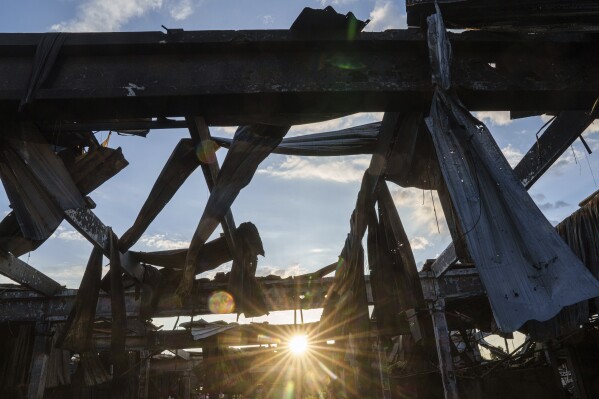 The destroyed Epicenter shopping complex is seen in Kharkiv, Ukraine, Thursday, June 6, 2024. The Russian military's shelling of the Epicenter with glide bombs in May killed 19 people, including two children.  In total, gliding bombs hit the city more than 50 times in 2024, according to Spartak Borysenko of the Kharkiv regional prosecutor's office.  (AP Photo/Evgeniy Maloletka)