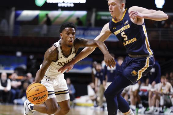 Montana State guard Xavier Bishop drives against Northern Colorado guard Dalton Knecht (5) during the first half of an NCAA college basketball game for the championship of the Big Sky men's tournament in Boise, Idaho, Saturday, March 12, 2022. (AP Photo/Otto Kitsinger)