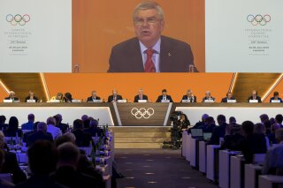 International Olympic Committee, IOC, President Thomas Bach from Germany speaks during the 134th Session of the International Olympic Committee (IOC), at the SwissTech Convention Centre, in Lausanne, Switzerland, Tuesday, June 25, 2019. (Jean-Christophe Bott/Keystone via AP)