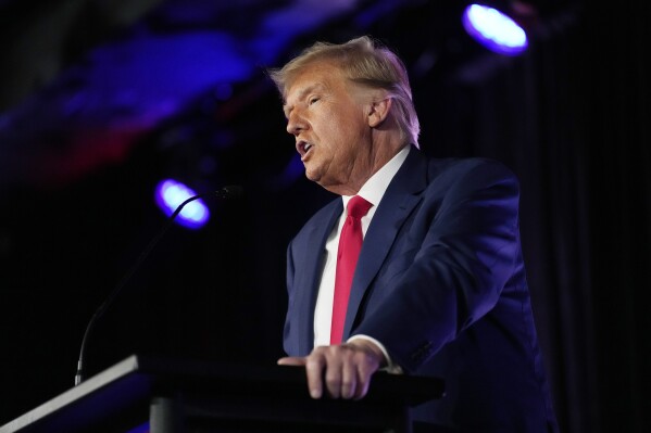 FILE - Former President Donald Trump speaks at a campaign event, Saturday, July 8, 2023, in Las Vegas. Trump is dominating the early stages of the Republican presidential primary even as he's refused to endorse a federal ban on abortion, allowing some top rivals to get to the right of him on an issue that animates many conservative activists. (AP Photo/John Locher, File)