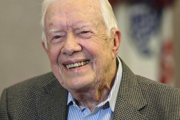 
              Former President Jimmy Carter, 93, sits for an interview about his new book "Faith: A Journey For All" which will debut at no. 7 on the New York Times best sellers list, pictured before a book signing Wednesday, April 11, 2018, in Atlanta. (AP Photo/John Amis)
            