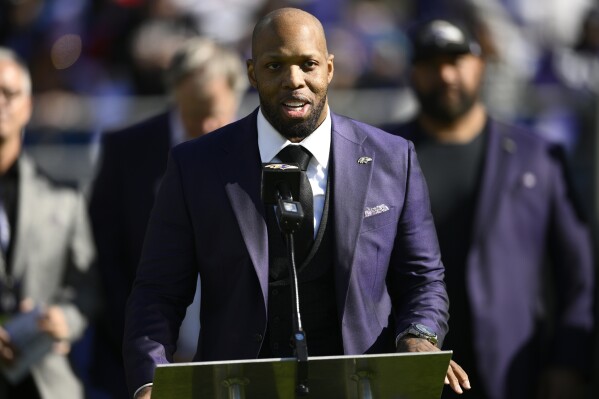 Former Baltimore Ravens outside linebacker Terrell Suggs speaks during his induction ceremony into the Ravens Ring of Honor during halftime of an NFL football game between the Baltimore Ravens and the Detroit Lions, Sunday, Oct. 22, 2023, in Baltimore. (AP Photo/Nick Wass, File)