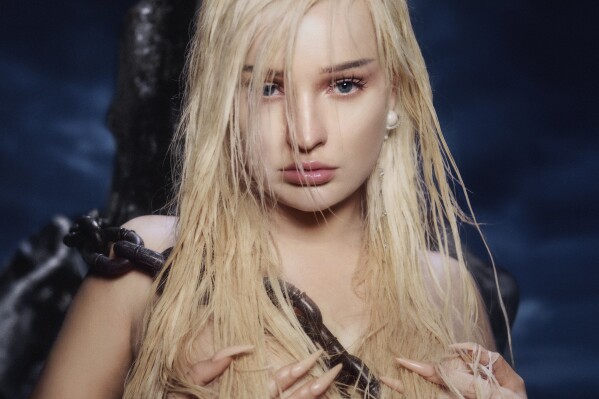 This cover image released by Republic Records/Amigo Records shows "Feed the Beast" by Kim Petras. (Republic Records/Amigo Records via AP)