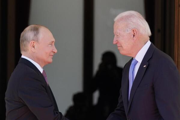 FILE - President Joe Biden and Russian President Vladimir Putin, arrive to meet at the 'Villa la Grange', in Geneva, Switzerland, June 16, 2021. (AP Photo/Patrick Semansky, File)