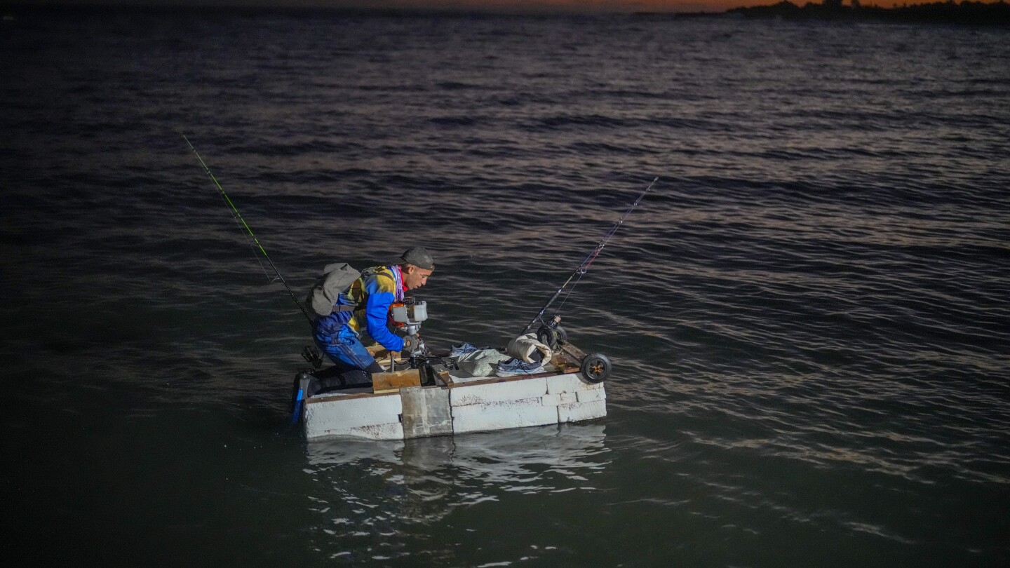 PHOTO GALLERY:Ingenuity at sea: Cubans use makeshift rafts known as 'corchos' to catch elusive fish